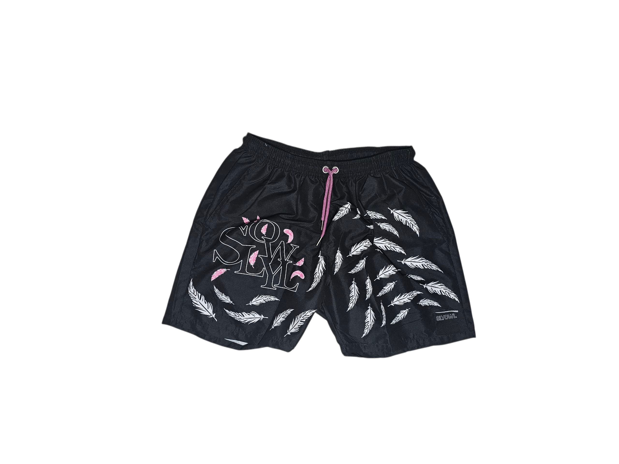 black shorts with feather pattern and 'SLYOWL' text on a white background