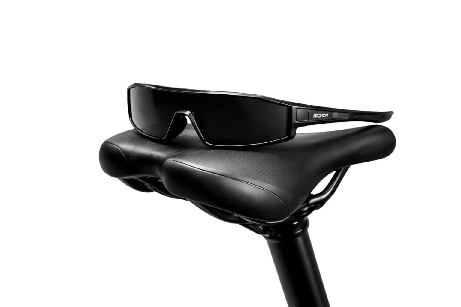 Black sunglasses on a bicycle seat with a white background