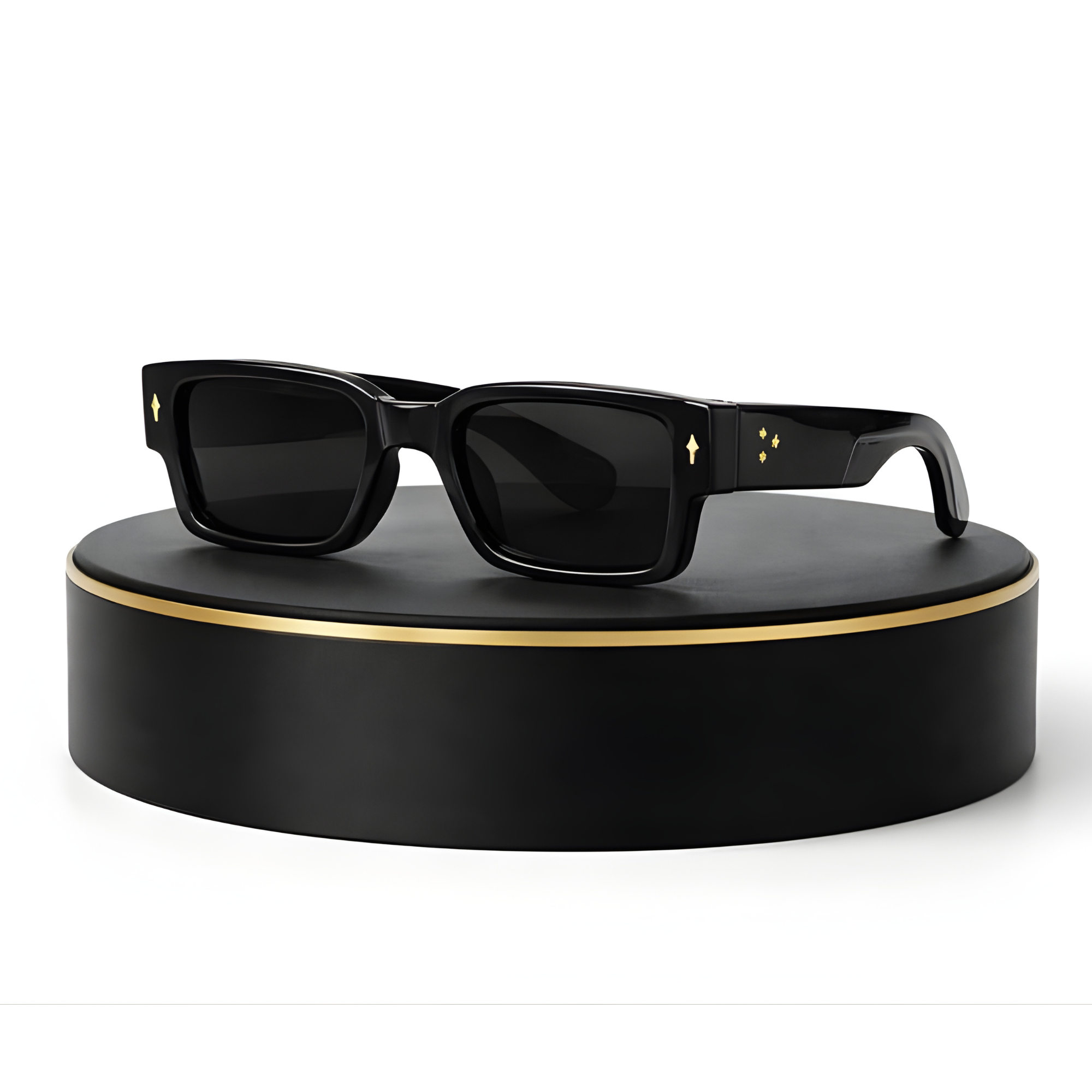 Black sunglasses on a black stand with gold accents against a white background