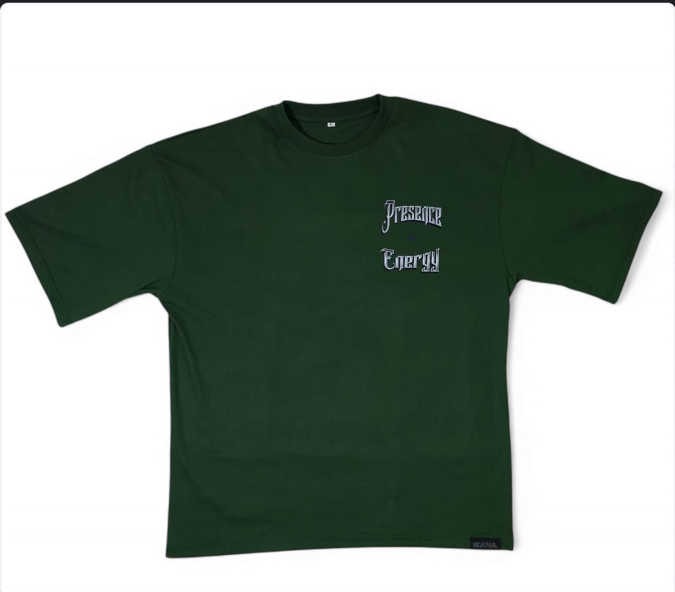 green t-shirt with a graphic of the text 'presence & energy' on the upper left side.