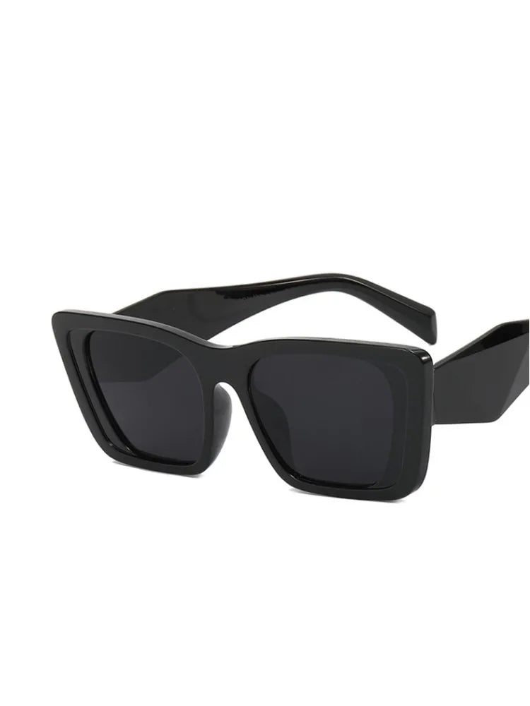 black cat-eye glasses with tinted lenses