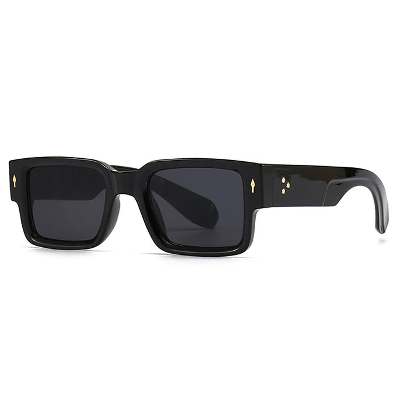 black square-rim glasses with gold accent marks