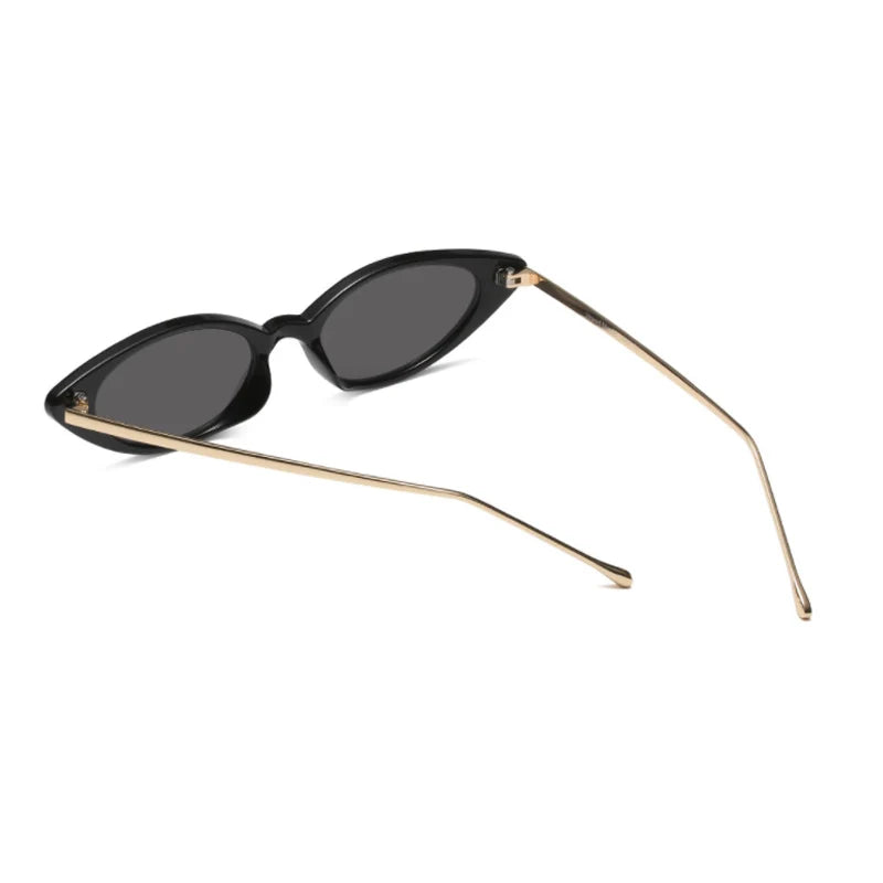 black slim eyeglasses with gold trim